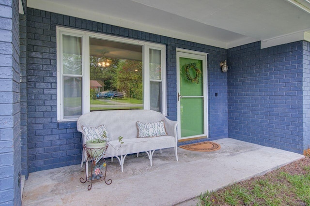 property entrance featuring a patio area