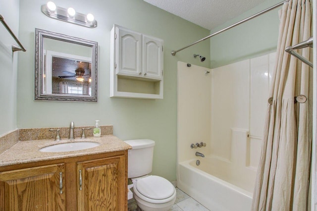 full bathroom with tile patterned flooring, shower / bath combination with curtain, a textured ceiling, toilet, and vanity