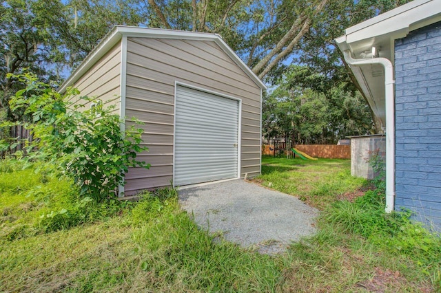 garage featuring a yard