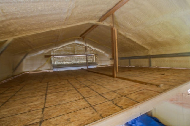 bonus room featuring lofted ceiling and tile patterned flooring