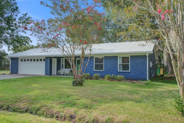 ranch-style house with a garage and a front lawn