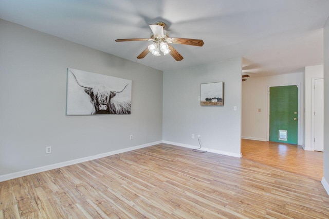 unfurnished room with ceiling fan and light hardwood / wood-style floors