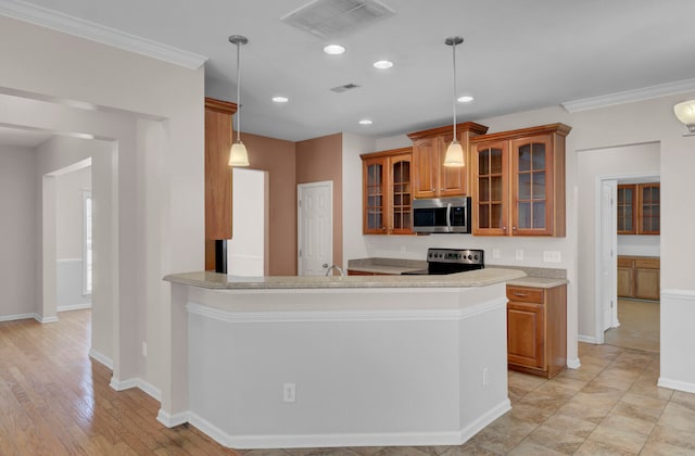 kitchen featuring kitchen peninsula, light tile floors, hanging light fixtures, ornamental molding, and appliances with stainless steel finishes