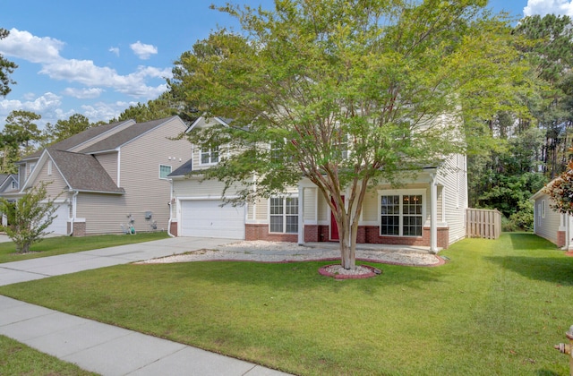 view of front of house with a garage and a front yard