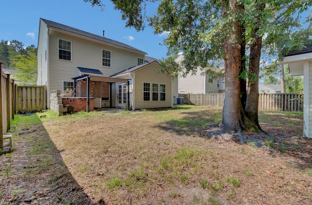 back of property with central air condition unit