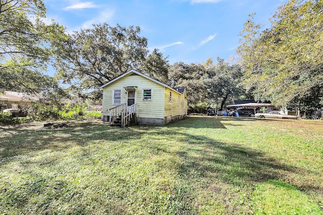 exterior space with a yard