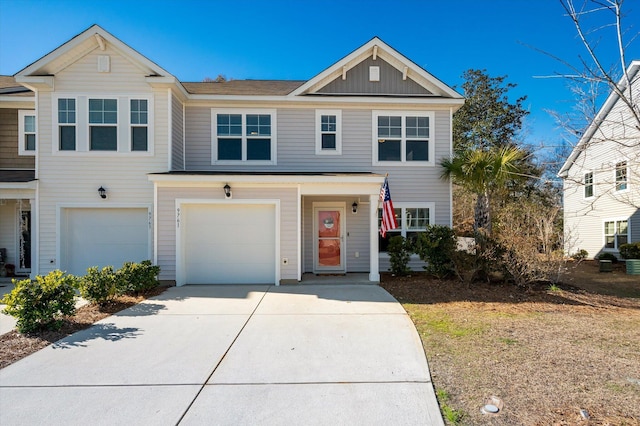 multi unit property featuring a garage