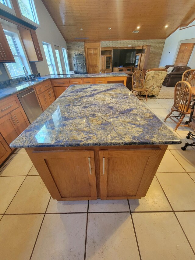 400 Murray Blvd, Summerville, SC 29483 - kitchen featuring light tile patterned floors, dishwasher, brick wall, and wooden ceiling