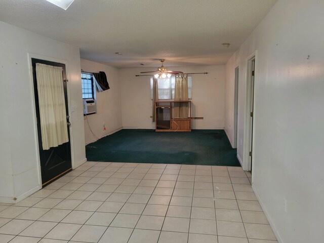 400 Murray Blvd, Summerville, SC 29483 - unfurnished room featuring ceiling fan, a textured ceiling, light tile patterned floors, and cooling unit