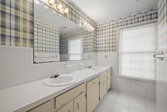 305 Whitewood Ct, Moncks Corner, SC 29461 - full bath with wallpapered walls, tile walls, double vanity, wainscoting, and tile patterned floors