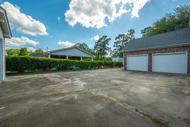 305 Whitewood Ct, Moncks Corner, SC 29461 - garage featuring driveway