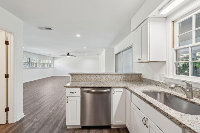 kitchen featuring a sink, white cabinetry, a ceiling fan, dark wood-type flooring, and stainless steel dishwasher