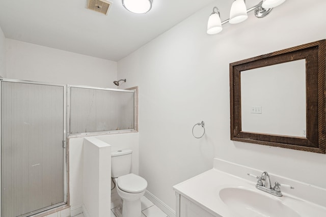 full bathroom featuring vanity, toilet, visible vents, and a stall shower