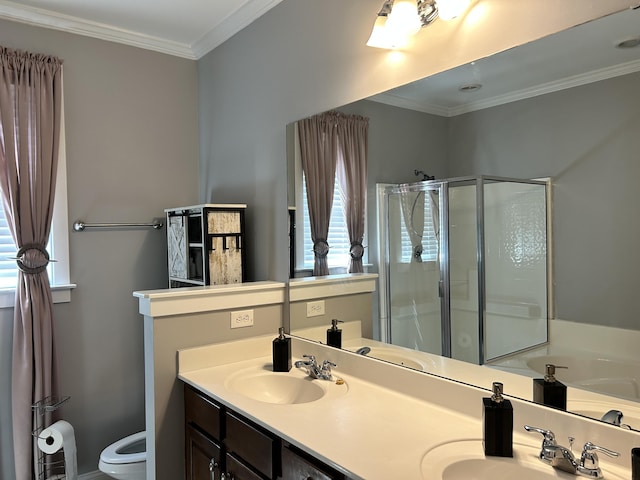 bathroom featuring a stall shower, ornamental molding, and a sink