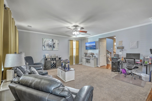 living area featuring ceiling fan, visible vents, crown molding, and light colored carpet