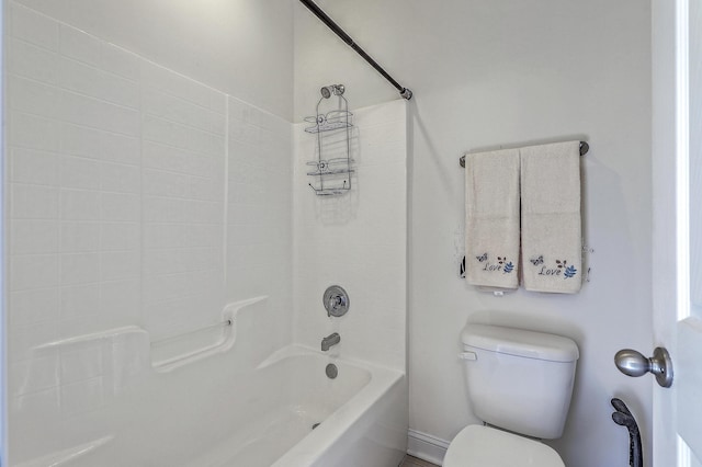 bathroom with toilet and shower / bathtub combination