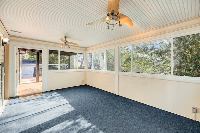 unfurnished sunroom featuring plenty of natural light