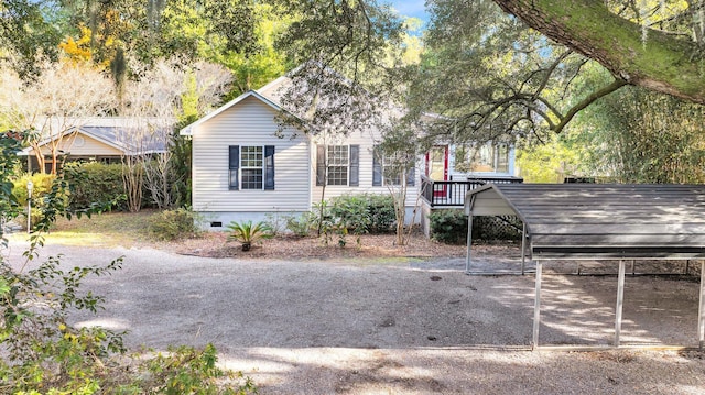 exterior space featuring a carport