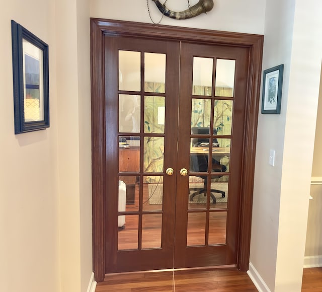 1736 James Basford Pl, Mount Pleasant, SC 29466 - entryway with french doors, baseboards, and wood finished floors