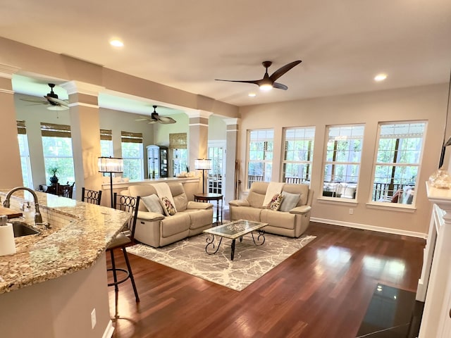 1736 James Basford Pl, Mount Pleasant, SC 29466 - living area featuring a ceiling fan, decorative columns, recessed lighting, and dark wood-type flooring