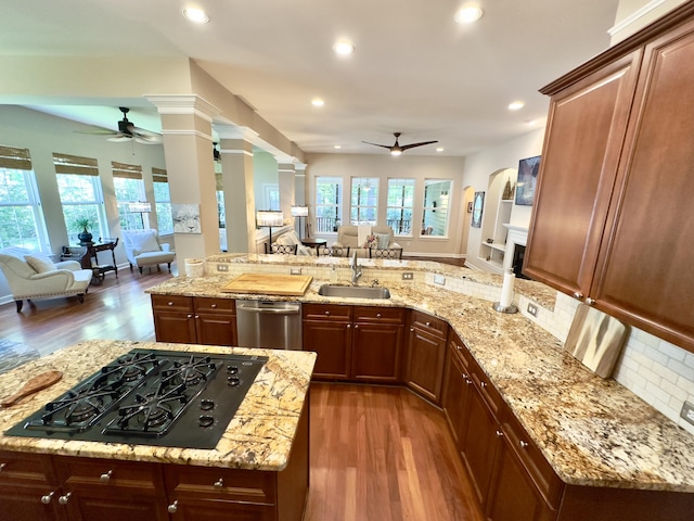 1736 James Basford Pl, Mount Pleasant, SC 29466 - kitchen featuring a ceiling fan, open floor plan, black gas stovetop, and a sink