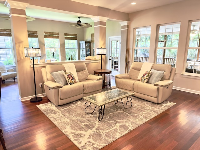 1736 James Basford Pl, Mount Pleasant, SC 29466 - living room with dark wood-style flooring, ceiling fan, ornate columns, recessed lighting, and a wealth of natural light