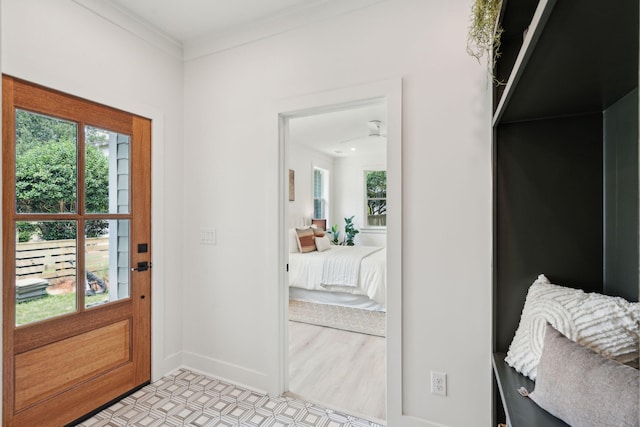 4620 Ohear Ave, North Charleston, SC 29405 - entrance foyer featuring light flooring, baseboards, and ornamental molding