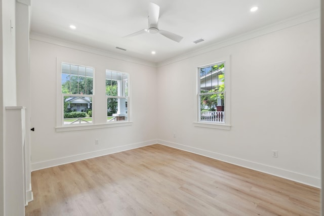 4620 Ohear Ave, North Charleston, SC 29405 - empty room with healthy amount of natural light, ornamental molding, light wood-type flooring, baseboards, and recessed lighting