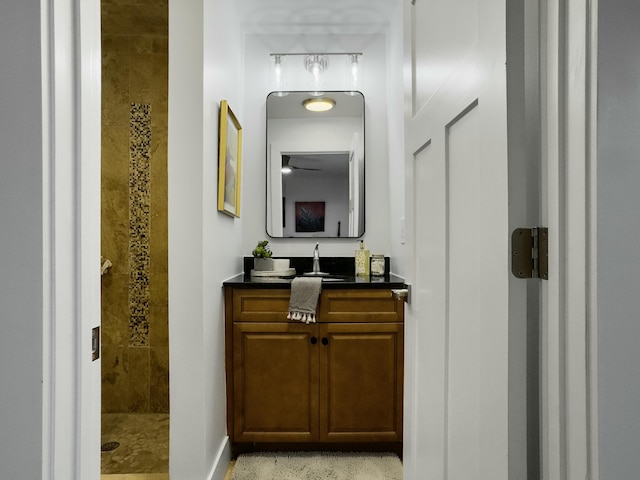 full bath featuring a shower stall and vanity