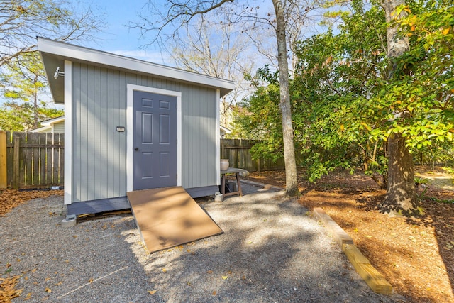 view of shed featuring a fenced backyard