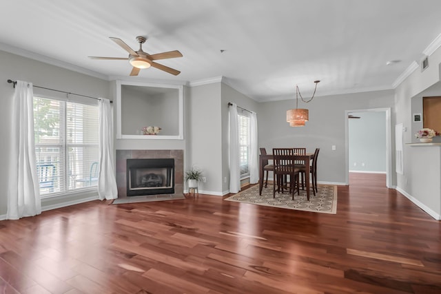 700 Daniel Ellis Dr Unit 3108, Charleston, SC 29412 - dining area with wood finished floors, ceiling fan, a tile fireplace, and crown molding