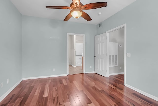 700 Daniel Ellis Dr Unit 3108, Charleston, SC 29412 - unfurnished bedroom featuring wood finished floors, ceiling fan, and ensuite bathroom