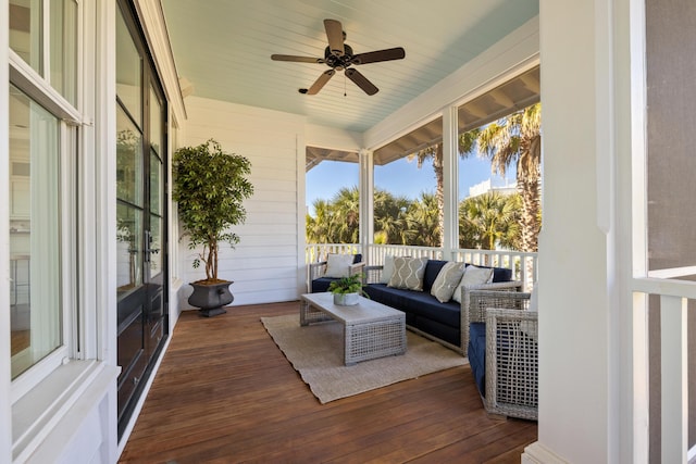 sunroom / solarium with ceiling fan