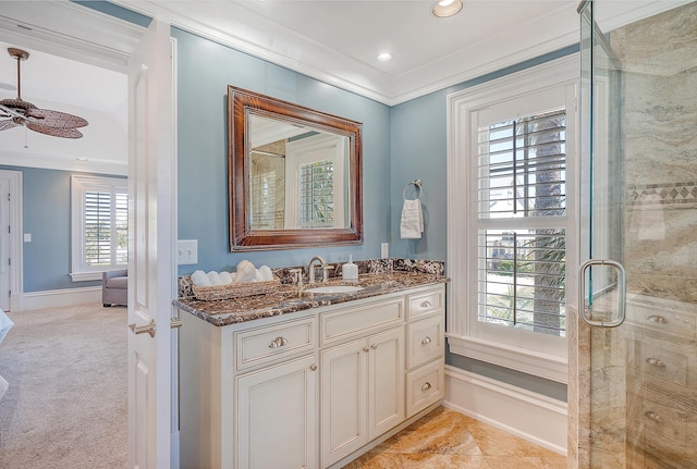 full bath with a shower with door, crown molding, recessed lighting, ceiling fan, and vanity