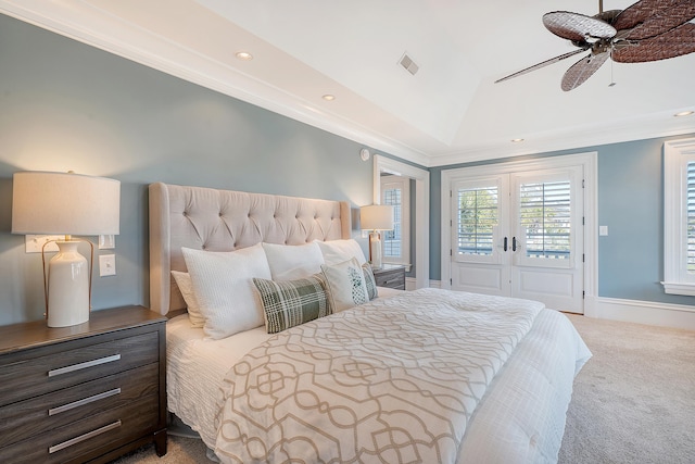 carpeted bedroom featuring vaulted ceiling, access to outside, visible vents, and crown molding