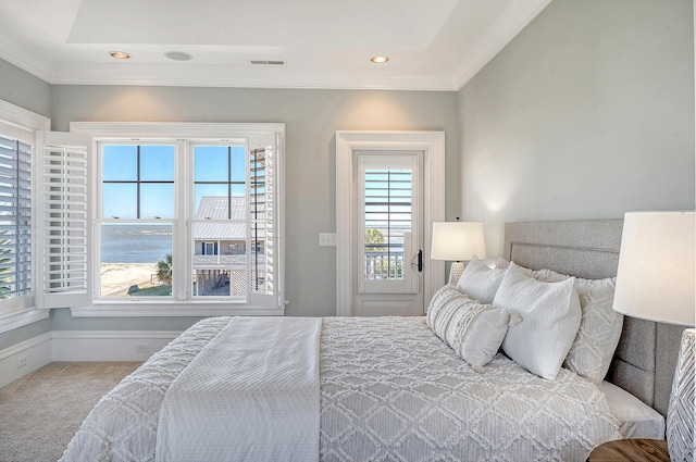 carpeted bedroom with ornamental molding, recessed lighting, and visible vents