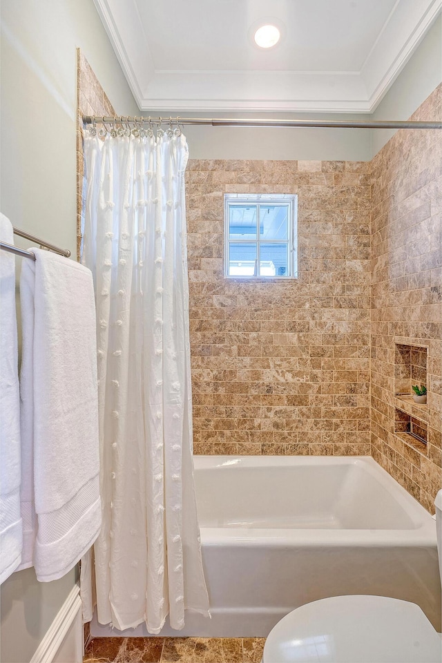 bathroom with shower / bath combo with shower curtain and crown molding