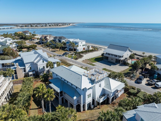 bird's eye view featuring a water view and a residential view