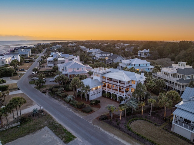 aerial view at dusk with a residential view