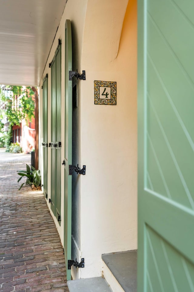 exterior space with stucco siding