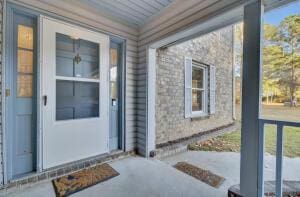 property entrance with a porch