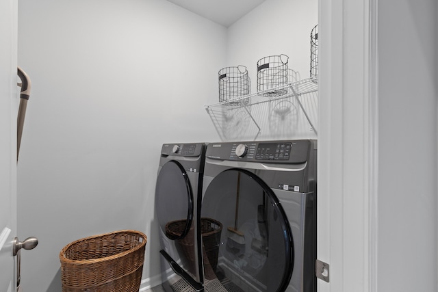 1173 Wading Point Blvd, Huger, SC 29450 - clothes washing area featuring separate washer and dryer