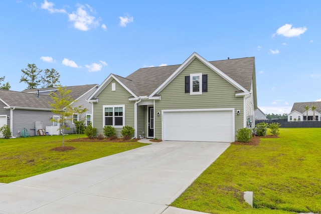 1173 Wading Point Blvd, Huger, SC 29450 - traditional-style home featuring an attached garage, driveway, and roof with shingles