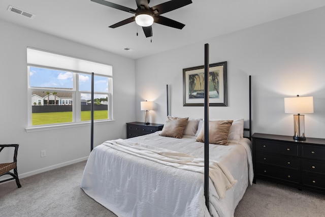 1173 Wading Point Blvd, Huger, SC 29450 - carpeted bedroom with baseboards and ceiling fan