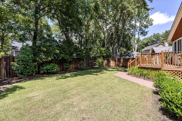 view of yard with a deck