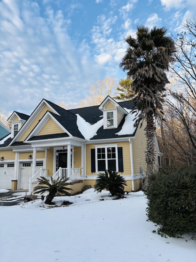 view of front of property with a garage