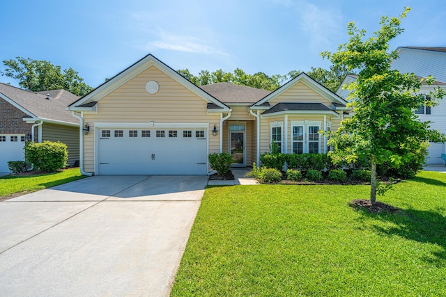 9710 Table Mountain Ln, Ladson, SC 29456 - ranch-style house with concrete driveway, an attached garage, a front lawn, and roof with shingles
