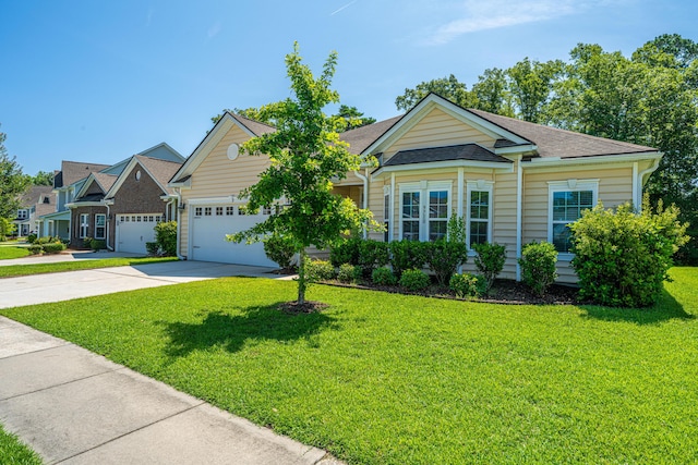 9710 Table Mountain Ln, Ladson, SC 29456 - view of front facade featuring driveway, a front yard, an attached garage, and a shingled roof