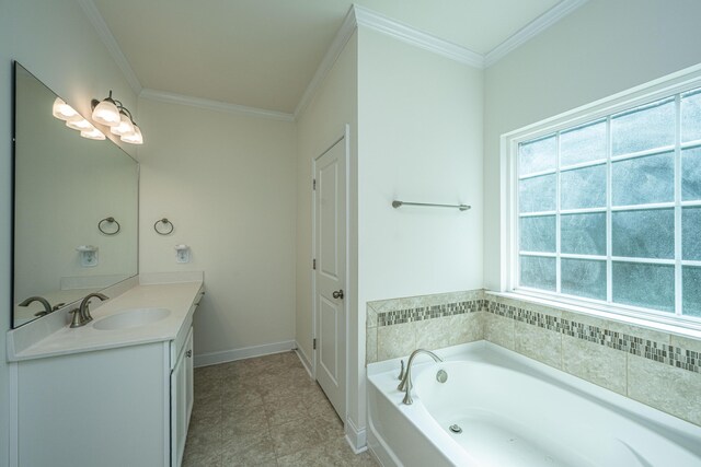 9710 Table Mountain Ln, Ladson, SC 29456 - bathroom featuring vanity, a garden tub, ornamental molding, and tile patterned floors