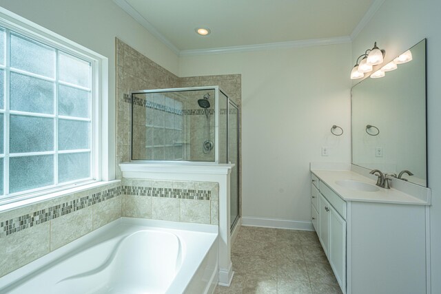9710 Table Mountain Ln, Ladson, SC 29456 - bathroom featuring a bath, vanity, a stall shower, ornamental molding, and tile patterned flooring